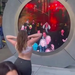 Woman flashes her boobs through live portal tv NYC and Dublin